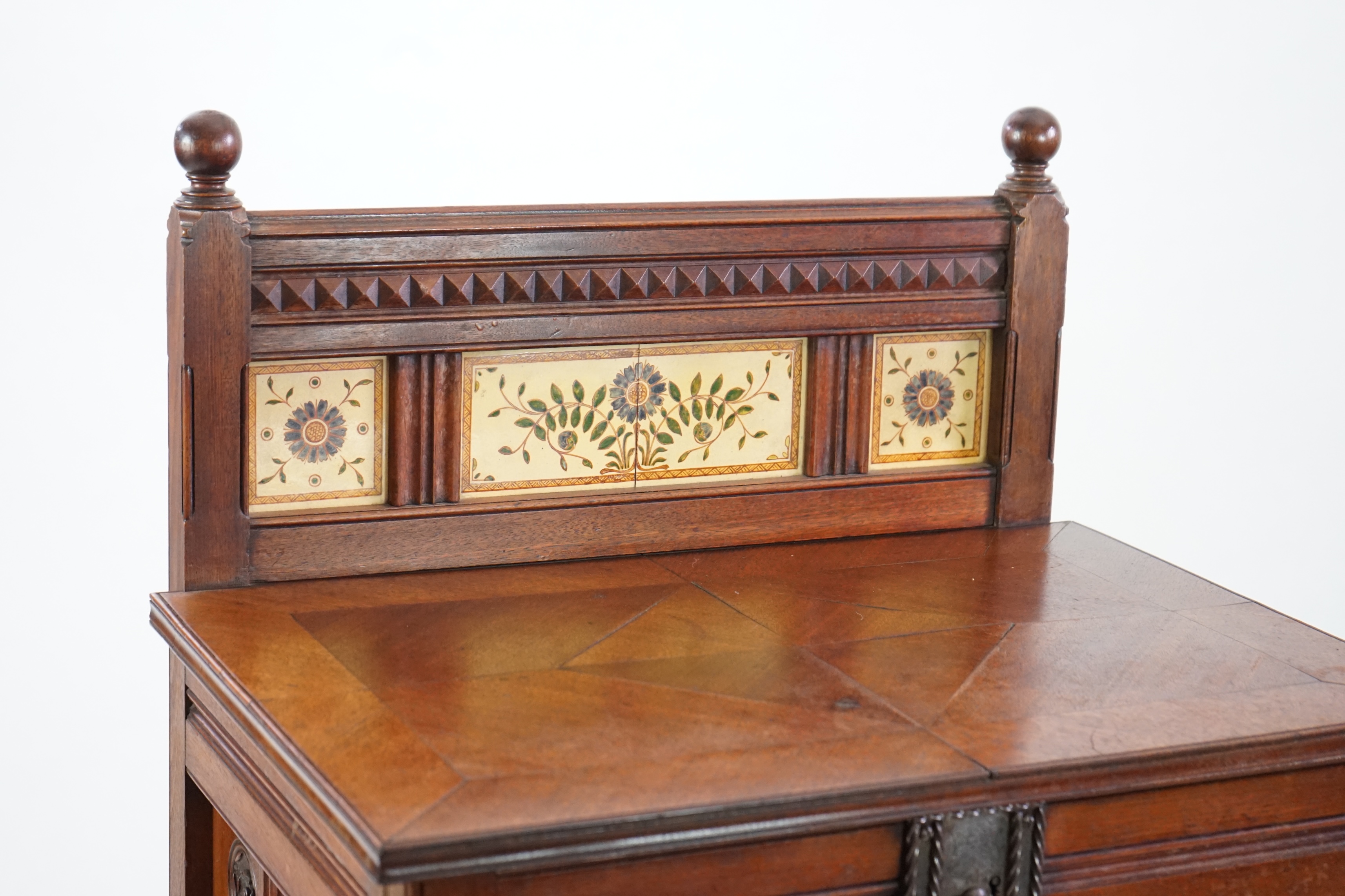 A Victorian Aesthetic Period walnut fall front desk attributed to Bruce James Talbert (1838-1881)